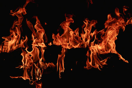 Abstract blaze fire flame texture for banner background. Fire flames on black background. Fire flame texture. Blaze flames background with copy space. Burning fire conceptの写真素材