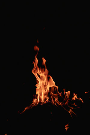 Fire flames on black background. Fire flame texture. Fire flame with copy space. Flames textured background. Flames on black background.の写真素材