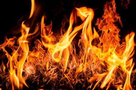 Fire flame background. Fire flames. Campfire texture. Flaming bonfire. Fire wallpaper. Bonfire background with copy space. Blaze fire flame texture background.の写真素材