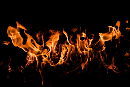 Fire flames on black background.の写真素材