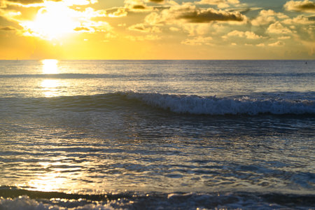 Sea with waves splashing and beach sand. Ocean wave seascape. Sea view for nature background.の写真素材