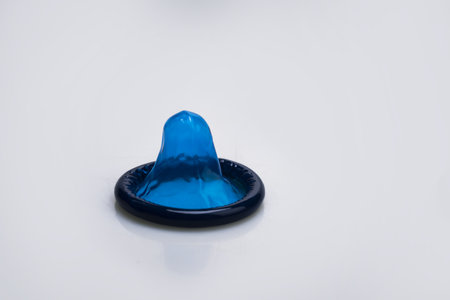 Condom isolated. Safe sex concept. Condom contraception. Sex education. Sex protection. Latex for sperm. Protection from pregnancy.の写真素材