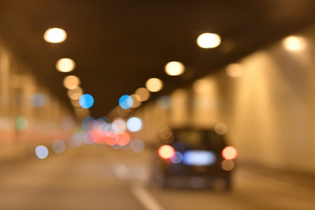 Drive. Car speed. Motion. Cars ride. Car in tunnel. Blurred car ride. Driving traffic. Speed riding. Car motion. Speed ride.の写真素材