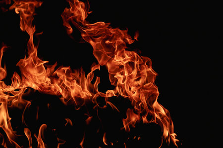Abstract blaze fire flame texture for banner background. Fire flames on black background. Fire flame...