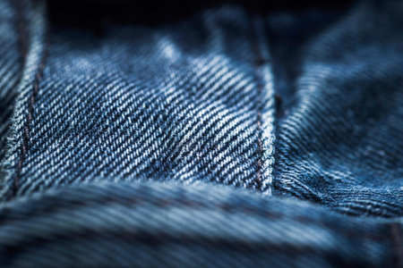 Jeans fabric. Jeans texture or denim background. Denim sales. Jeans fabric texture. Jean trousers...