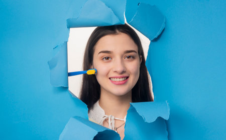 Dental clinic. Dental and stomatology concept. Dental treatment. Dental floss. Teeth examined at dentists. Healthy woman teeth and toothbrush. Ideal teeth. Stomatology clinic background.の写真素材