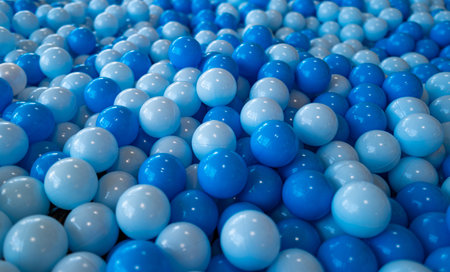 Blue ball pattern. Close up of plastic balls in a kids ball pool. Kids playground. Recreation and entertainment concept. Colorful kid blue ball. Colorful blue ball at the playground.の写真素材