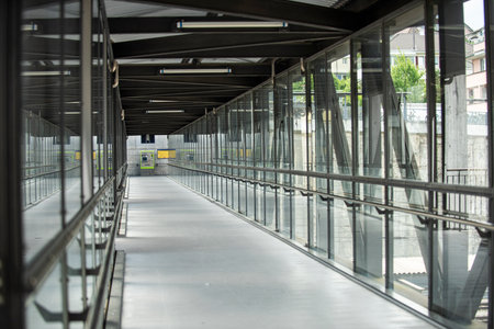 Industrial background. Modern Glass building Exterior. Glass windows. Industry building background. Modern glass wall facade buildings. Glass wall architecture details.の写真素材