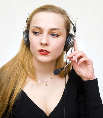 The young girl listens to fine soundsの写真素材