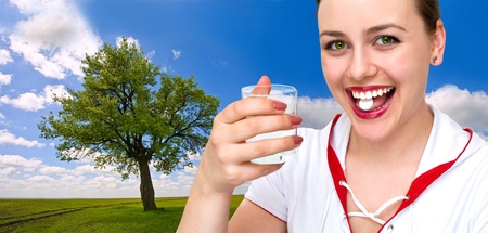 a healthy and happy girl accepts vitaminsの写真素材