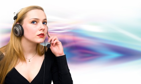 The young girl listens to fine soundsの写真素材