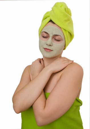 facial mask for young woman in the salon of beauty の写真素材