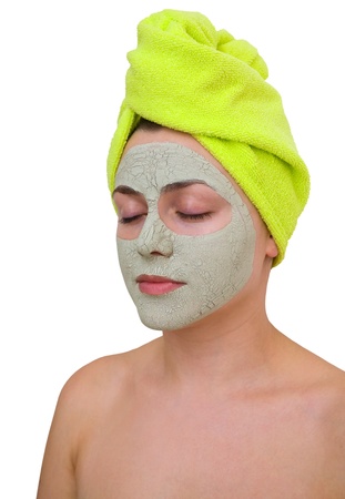 facial mask for young woman in the salon of beauty - close-upの写真素材