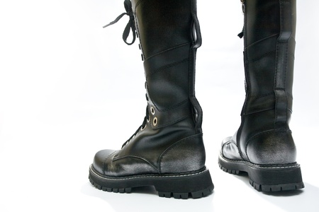 The high black boots on a white backgroundの写真素材