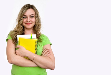 Woman in the green jersey with a notebookの写真素材