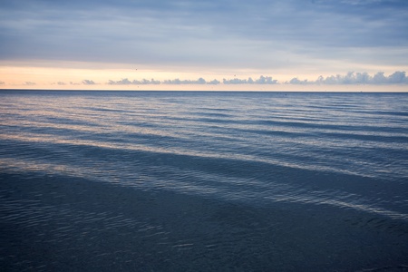 morning. Beautiful clouds over the calm sea.の写真素材