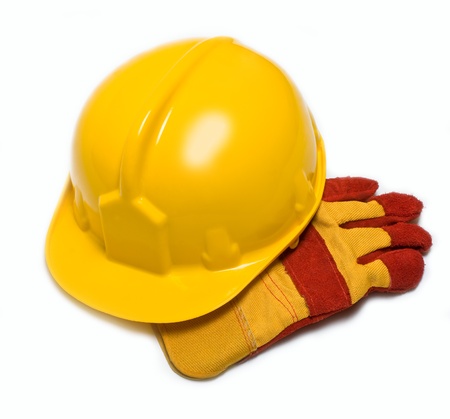 construction helmet and gloves on a white backgroundの写真素材