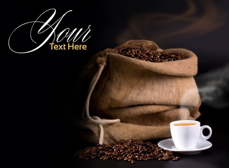 bag of coffee beans and hot coffee on a dark backgroundの写真素材