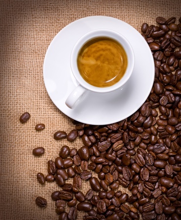 Cup of hot drink with coffee beam'sの写真素材