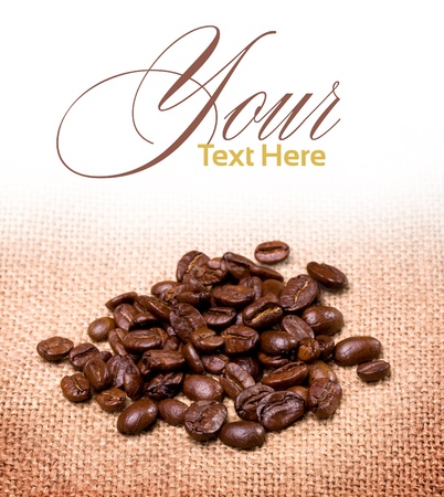 coffee beans on sacking background with copyspaseの写真素材