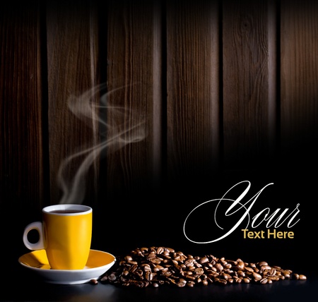 coffee cup and beans on the dark backgroundの写真素材