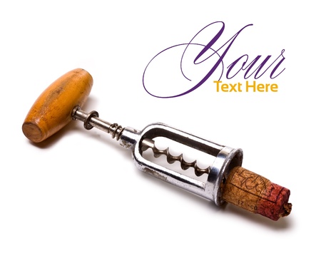 Old corkscrew and cork on a white backgroundの写真素材