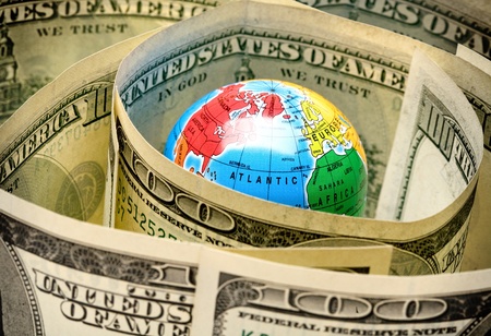 money taken over the world into a tight knotの写真素材