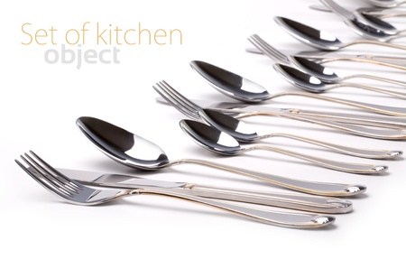 Silver fork and spoon, knife on whiteの写真素材