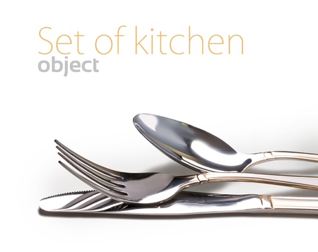 Knife, fork and spoon isolated on whiteの写真素材