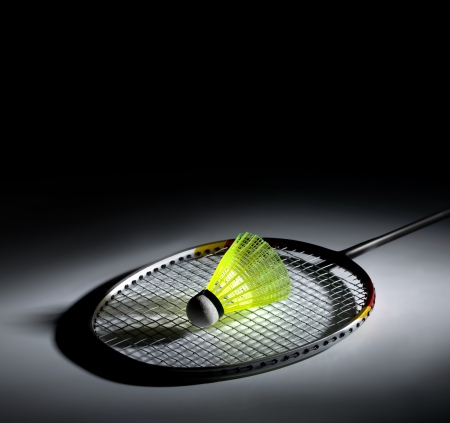 Shuttlecock and badminton on dark backgroundの写真素材