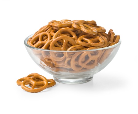 Closeup of bowl with baked pretzels isolated on white backgroundの写真素材