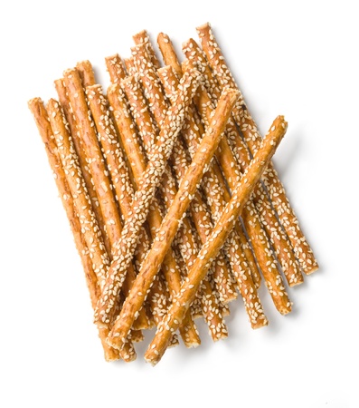 sweet crispy straw with poppy seeds on a white backgroundの写真素材