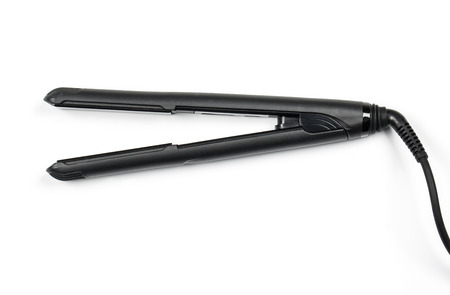 Black Hair iron isolated on white backgroundの写真素材