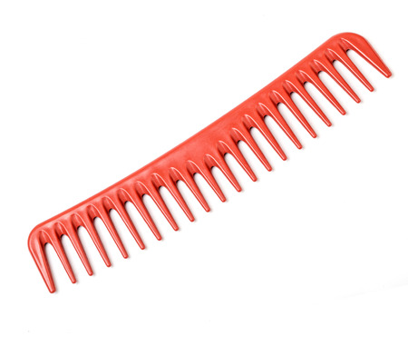 new red comb on a white background
