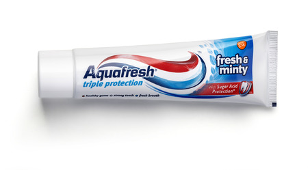CHISINAU, MOLDOVA - March 23, 2016. Aquafresh  Toothpaste with Sugar Acid Protection.Aquafresh is a brand of oral healthcare products founded in 1973 and manufactured by GlaxoSmithKlineのeditorial素材