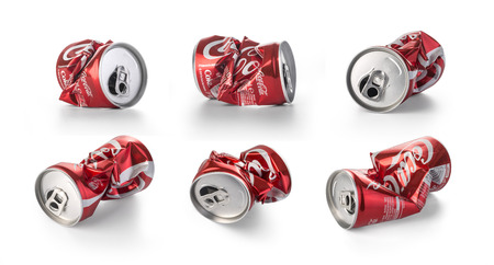 Chisinau, Moldova - August, 26, 2016:Crumpled Coca Cola cans. Coca Cola drinks are produced and manufactured by The Coca-Cola Company, an American multinational beverage corporation.のeditorial素材