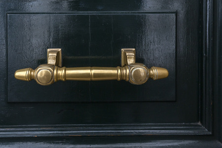 Vintage gate latch on the wooden doorの写真素材