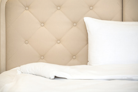 Interior of a  bed hotel room backgroundの写真素材