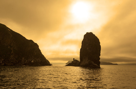 Kamchatka colorful seascape: beautiful view of Rocks in Avachinskaya Bay (Pacific Ocean) at sunset. Kamchatka Peninsula, Russian Far East, Eurasia.の写真素材
