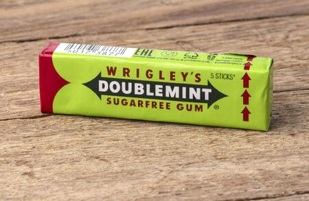 CHISINAU, MOLDOVA - February 01, 2018: doublemint chewing gum made by Wrigley on wooden table