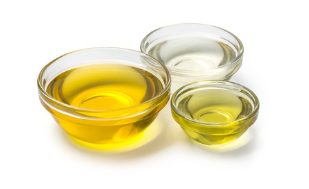 A bowl of  oil on white background with clipping pathの写真素材