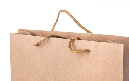Paper shopping bag isolated on white background close upの写真素材