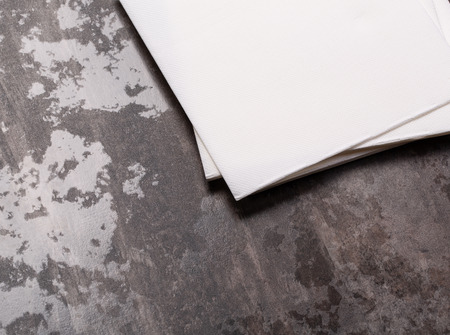 white paper napkin on Gray Stone Table Background.の写真素材
