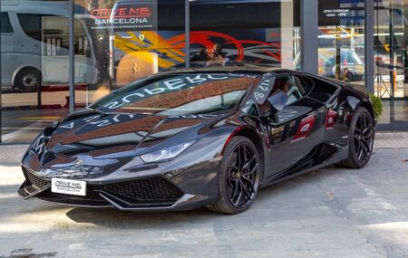 Barcelona, Spain December 15, 2018: Black Lamborghini Huracan in Barcelona Marinaのeditorial素材