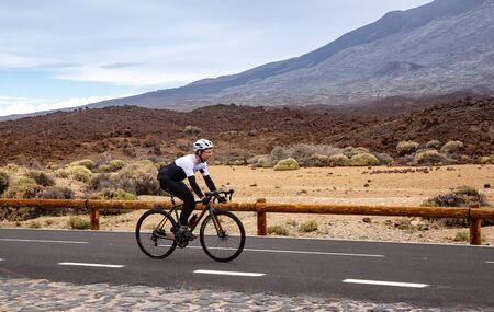 Tenerife, Spain December 24. 2018: Men cycling road bike in the Teide national Park. Spainのeditorial素材