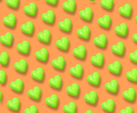 green heart pattern on orange background