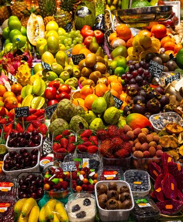 Barcelona, Spain - 15 JDecember , 2018: Famous La Boqueria market with fresh fruits in Barcelona, Spain.のeditorial素材