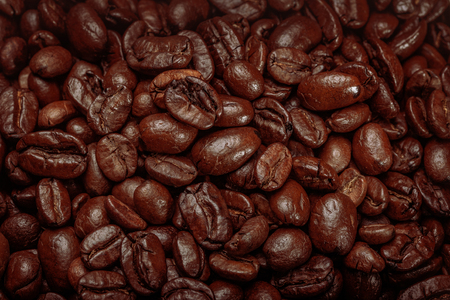 roasted coffee beans for background coffee close upの写真素材