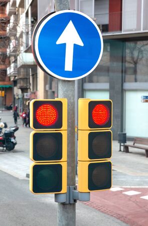 City traffic light showing red.の写真素材