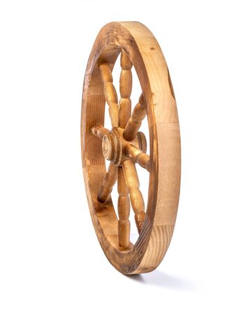 wooden wheel isolated on a white backgroundの写真素材